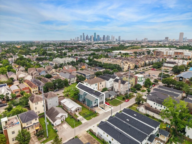birds eye view of property featuring a city view