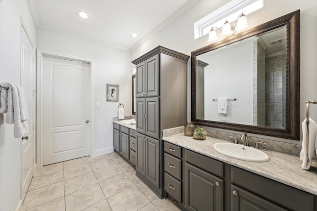 bathroom with vanity, ornamental molding, baseboards, recessed lighting, and tile patterned floors