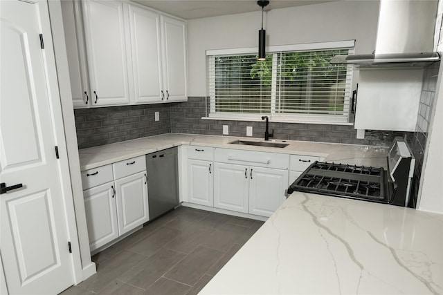 kitchen featuring tasteful backsplash, a sink, wall chimney exhaust hood, and dishwasher