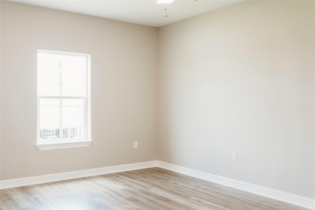 528 Thunder Rd, Surfside Beach, TX 77541 - spare room featuring light wood-style flooring and baseboards
