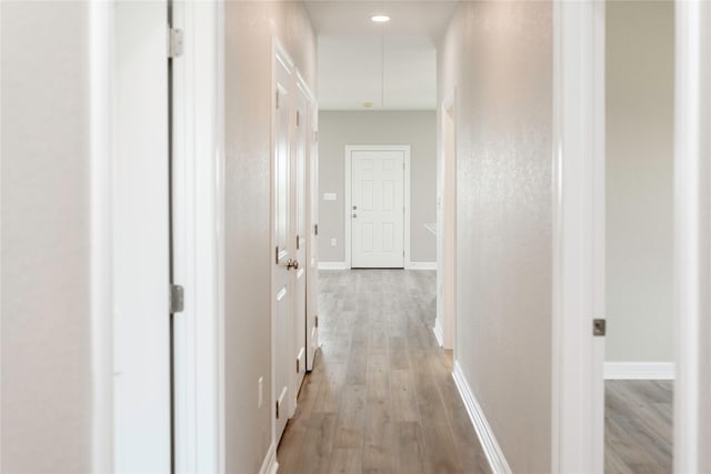 528 Thunder Rd, Surfside Beach, TX 77541 - corridor featuring light wood-style flooring and baseboards
