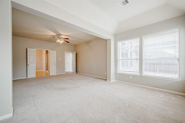 17931 Oakfield Glen Ln, Cypress, TX 77433 - spare room featuring light carpet, a ceiling fan, baseboards, vaulted ceiling, and visible vents