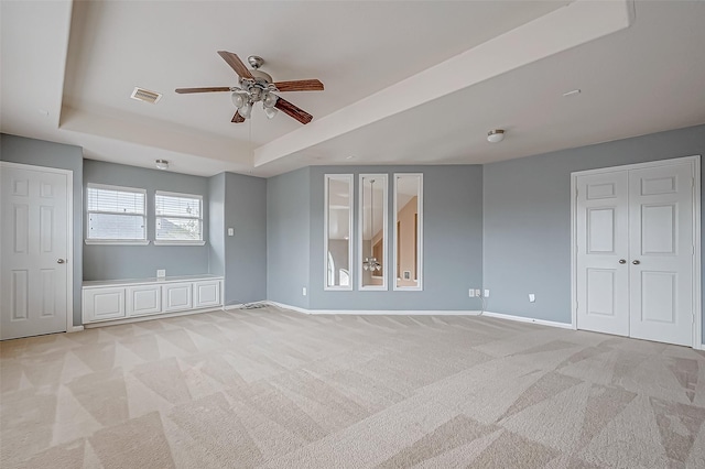 17931 Oakfield Glen Ln, Cypress, TX 77433 - unfurnished room featuring a ceiling fan, visible vents, light carpet, and a raised ceiling