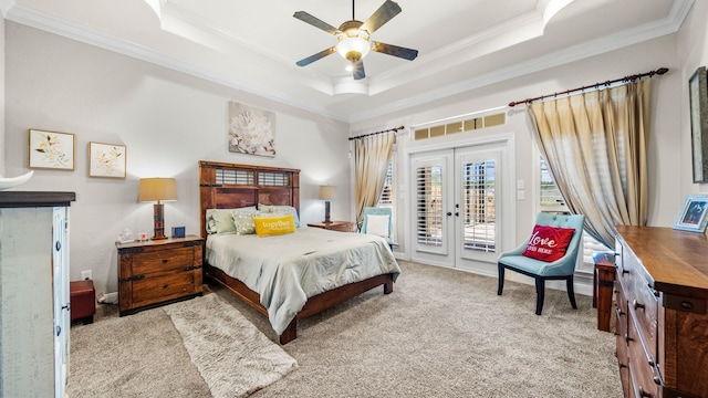 12722 Longmire Way, Conroe, TX 77304 - carpeted bedroom with crown molding, a tray ceiling, access to outside, french doors, and a ceiling fan