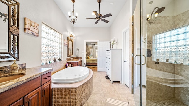12722 Longmire Way, Conroe, TX 77304 - ensuite bathroom with a shower stall, vanity, a tub with jets, a ceiling fan, and tile patterned floors