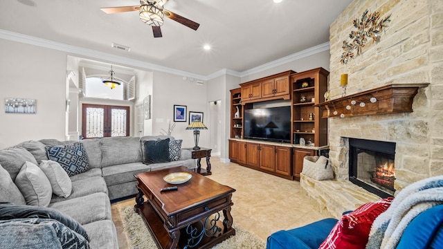 12722 Longmire Way, Conroe, TX 77304 - living room featuring a fireplace, a ceiling fan, french doors, ornamental molding, and recessed lighting