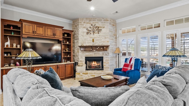 12722 Longmire Way, Conroe, TX 77304 - living room with crown molding, a ceiling fan, and a fireplace