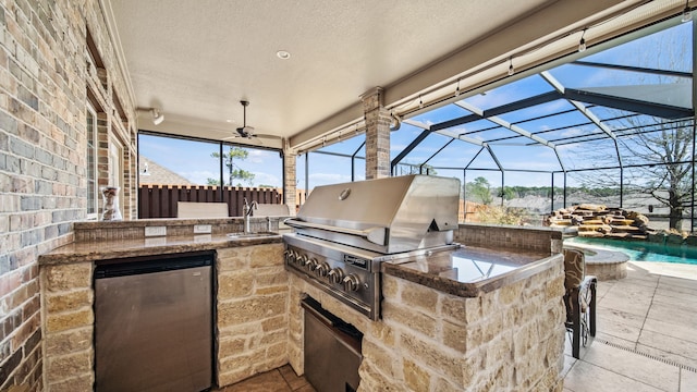 12722 Longmire Way, Conroe, TX 77304 - view of patio featuring ceiling fan, an outdoor pool, a sink, and glass enclosure