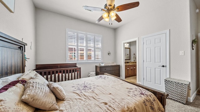 12722 Longmire Way, Conroe, TX 77304 - bedroom with light colored carpet, connected bathroom, and a ceiling fan