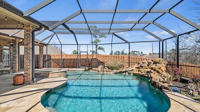 12722 Longmire Way, Conroe, TX 77304 - view of swimming pool featuring a fenced backyard, glass enclosure, a patio, and a pool with connected hot tub