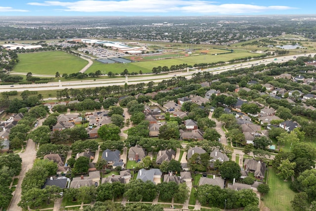 birds eye view of property with a residential view