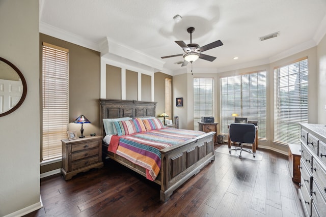 bedroom with visible vents, ornamental molding, and baseboards