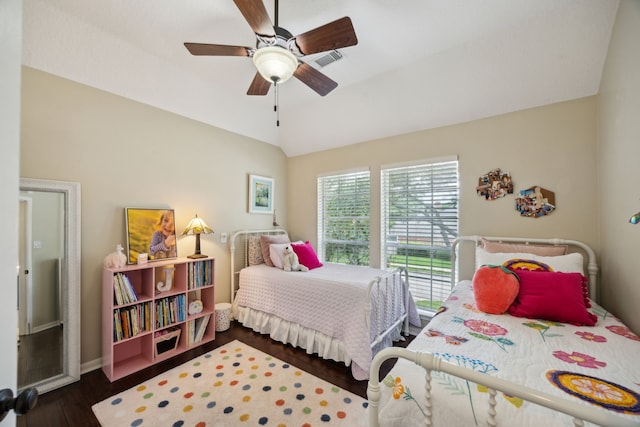bedroom with dark wood-style flooring, ceiling fan, baseboards, lofted ceiling, and visible vents