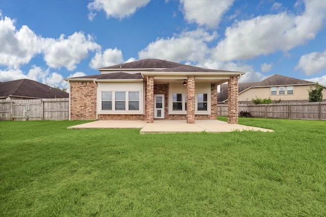 back of house with a ceiling fan, a patio area, and a fenced backyard