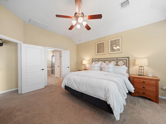 bedroom with carpet, lofted ceiling, and visible vents
