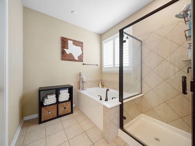 full bath with tile patterned floors, a shower stall, and a bath