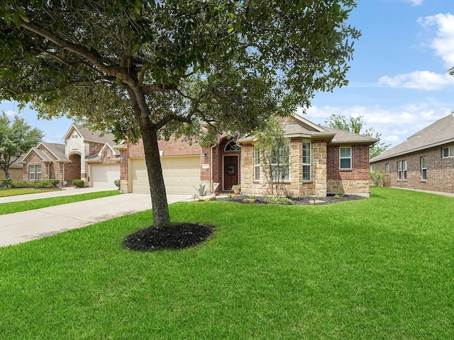 view of front of property with concrete driveway, stone siding, an attached garage, and a front yard