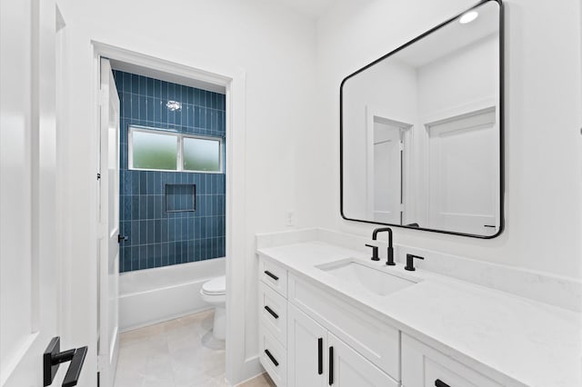 bathroom with shower / bath combination, vanity, and toilet