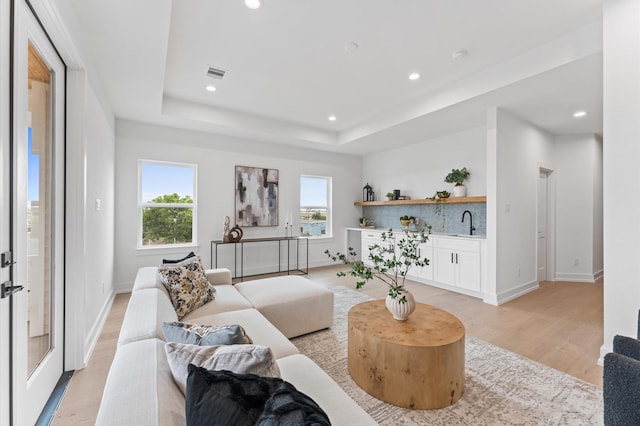 819 Dorothy St Unit A, Houston, TX 77008 - living room with plenty of natural light, recessed lighting, light wood finished floors, and baseboards