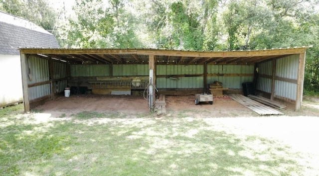 20610 Live Oak Dr, Damon, TX 77430 - view of parking / parking lot with an outbuilding and a carport