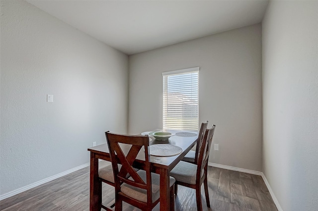 15314 Stulan Burn Dr, Humble, TX 77346 - dining area with baseboards and wood finished floors