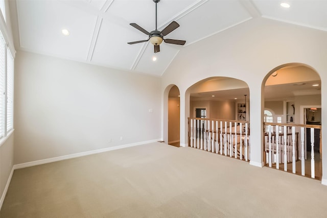 3210 Oakmont Dr, Sugar Land, TX 77479 - empty room with carpet floors, a ceiling fan, vaulted ceiling, and a wealth of natural light