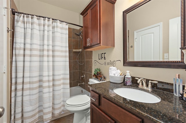 full bathroom with vanity, toilet, and shower / tub combo with curtain