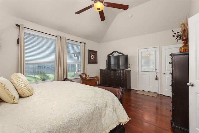 bedroom featuring ceiling fan, dark wood-style floors, and lofted ceiling