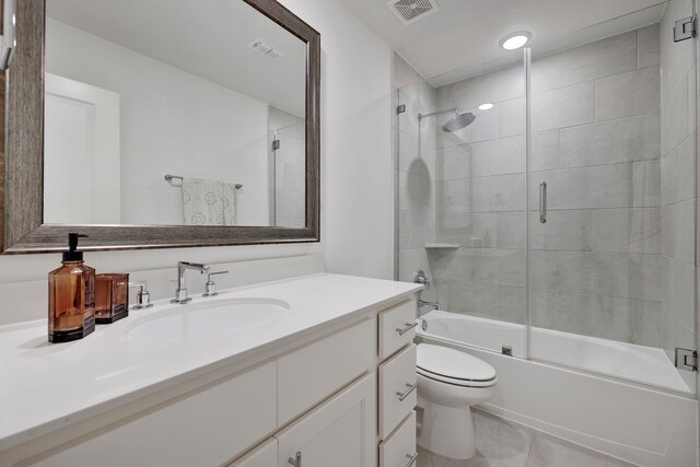 bathroom with visible vents, vanity, toilet, recessed lighting, and enclosed tub / shower combo
