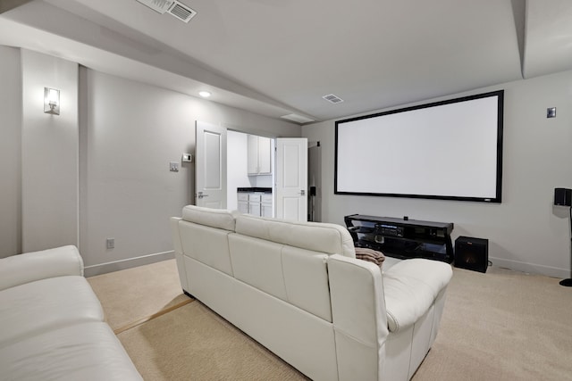 cinema featuring light colored carpet, recessed lighting, baseboards, and visible vents