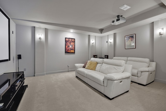 cinema room with visible vents, recessed lighting, baseboards, and light carpet