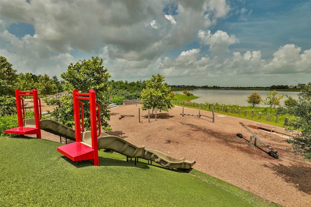 view of playground featuring a water view