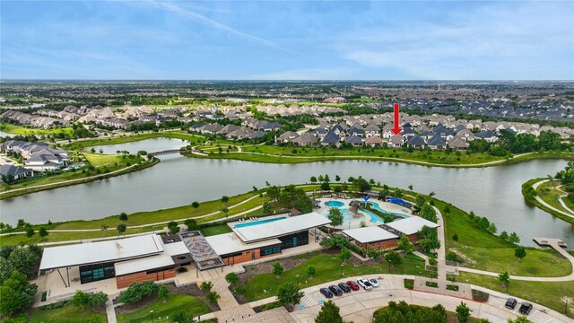 aerial view featuring a water view and a residential view