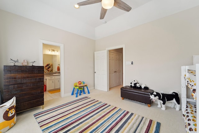 recreation room with light carpet and a ceiling fan