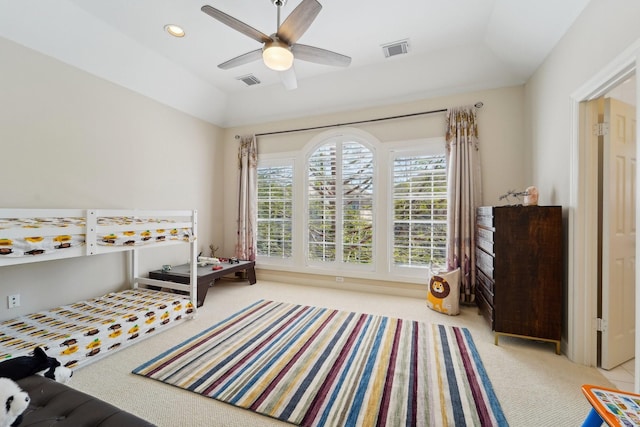carpeted bedroom with visible vents, recessed lighting, and a ceiling fan