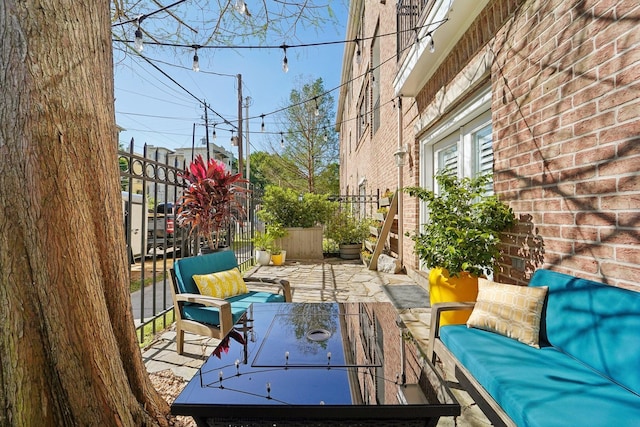 view of patio / terrace with fence