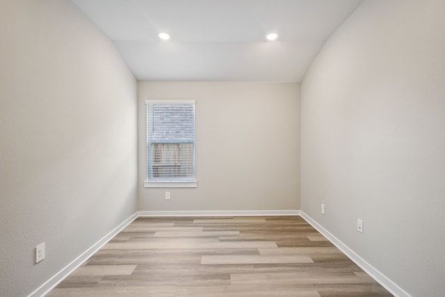 5030 Magnolia Springs Dr, Pearland, TX 77584 - empty room featuring baseboards, light wood finished floors, and recessed lighting