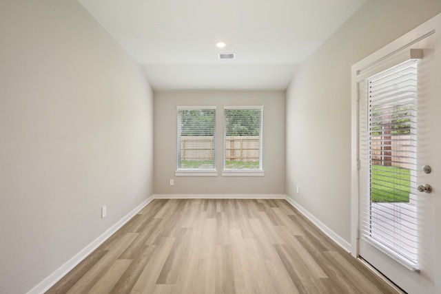 5030 Magnolia Springs Dr, Pearland, TX 77584 - spare room featuring light wood-style floors and baseboards