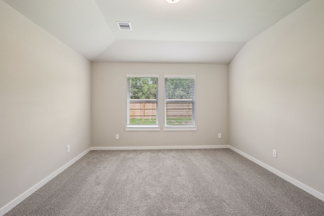 5030 Magnolia Springs Dr, Pearland, TX 77584 - spare room with carpet flooring, vaulted ceiling, and baseboards