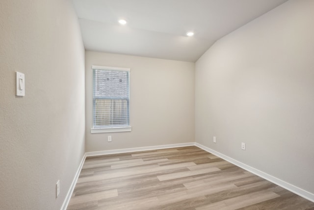 5030 Magnolia Springs Dr, Pearland, TX 77584 - empty room with light wood finished floors, baseboards, recessed lighting, and vaulted ceiling