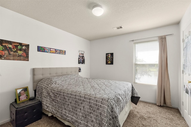 19527 Hardwood Ridge Trl, Cypress, TX 77429 - bedroom featuring carpet, a textured ceiling, and baseboards