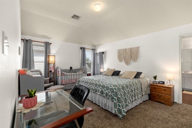 19527 Hardwood Ridge Trl, Cypress, TX 77429 - carpeted bedroom featuring lofted ceiling and ensuite bathroom