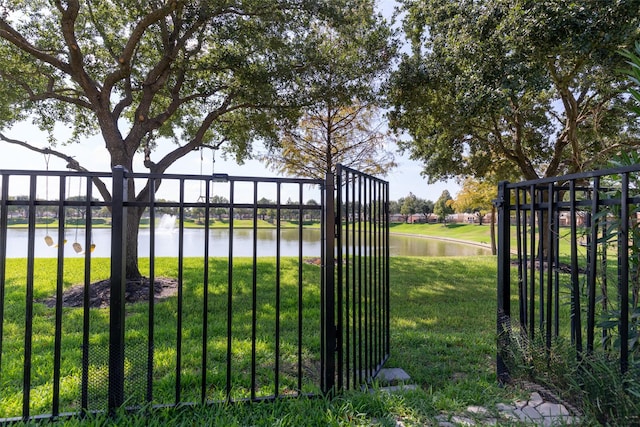 19527 Hardwood Ridge Trl, Cypress, TX 77429 - gate featuring a water view
