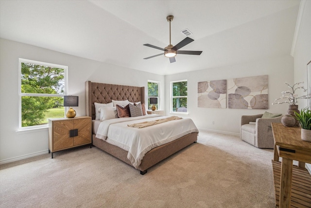 bedroom with baseboards, visible vents, light carpet, and ceiling fan