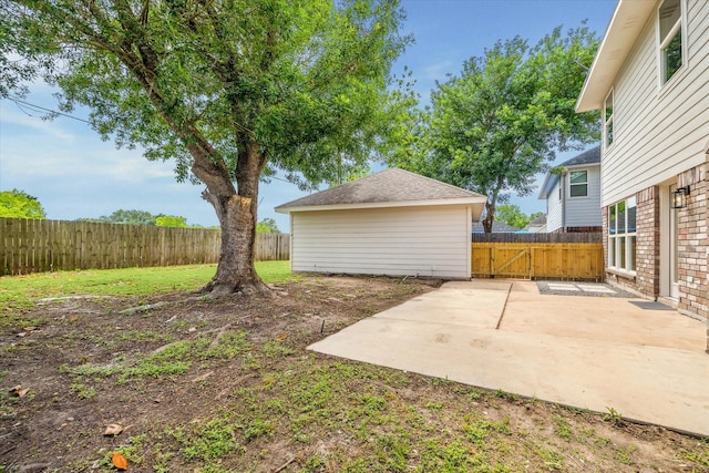 view of yard featuring a patio and a fenced backyard