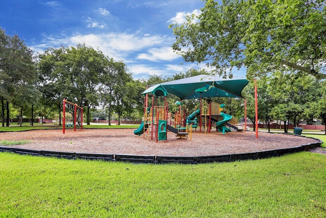 communal playground with a lawn