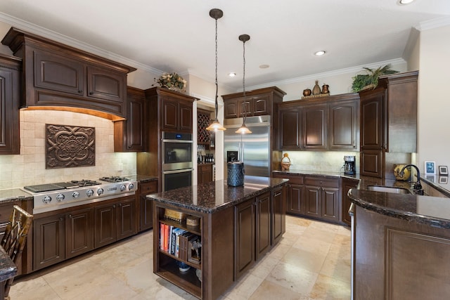 3034 Serena Vista Way, Houston, TX 77068 - kitchen featuring appliances with stainless steel finishes, a sink, dark brown cabinetry, tasteful backsplash, and a kitchen island