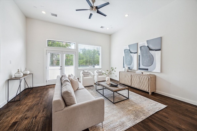living area featuring french doors, a ceiling fan, baseboards, wood finished floors, and visible vents