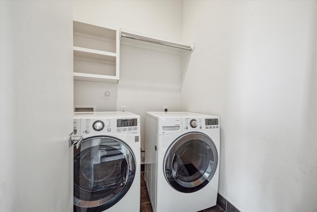 clothes washing area with laundry area and independent washer and dryer
