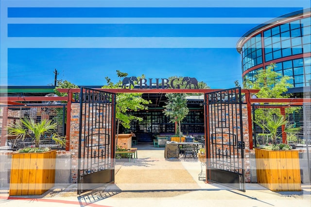 view of home's community with a gate